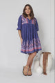 JAASE - Goldie Mini Dress: Crew Neckline with Tassel Ties Smock Dress in Celestial Print